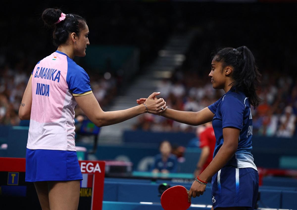 Manika Batra shakes hands with Prithika Pavade after the match.