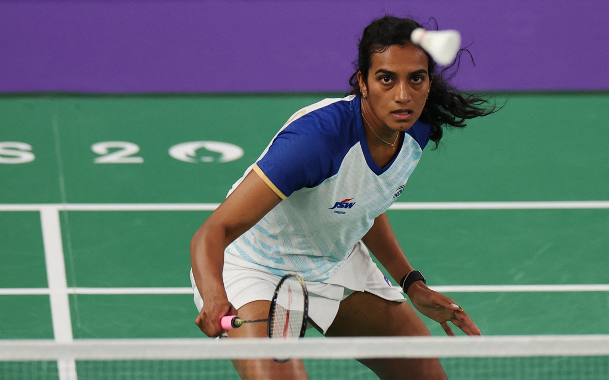 P V Sindhu in action against the Maldives' Fathimath Nabaaha Abdul Razzaq in the Olympics women's singles Group M badminton match at Porte de La Chapelle Arena, Paris, July 28, 2024.