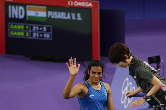 PV Sindhu acknowledges the crowd after winning the match against Kristin Kuuba