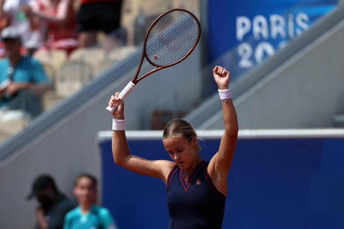 Slovakia's Anna Karolina Schmiedlova celebrates after winning her women's singles quarterfinal against Wimbledon champion Barbora Krejcikova of the Czech Republic. 