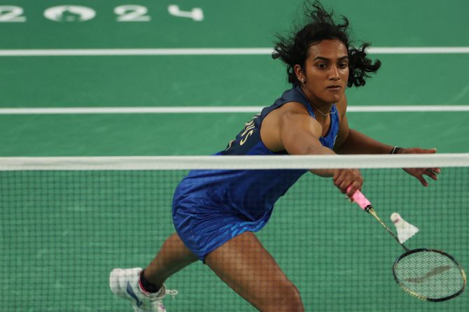 India's PV Sindhu in action during the Badminton Women's Singles Group M match against Kristin Kuuba of Estonia at Porte de La Chapelle Arena, Paris, France, at the Paris Olympics, on Wednesday