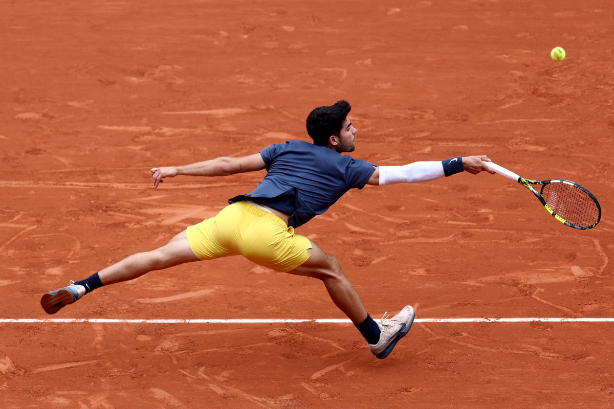 Spain's Carlos Alcaraz in action during his fourth round match against Canada's Felix Auger-Aliassime