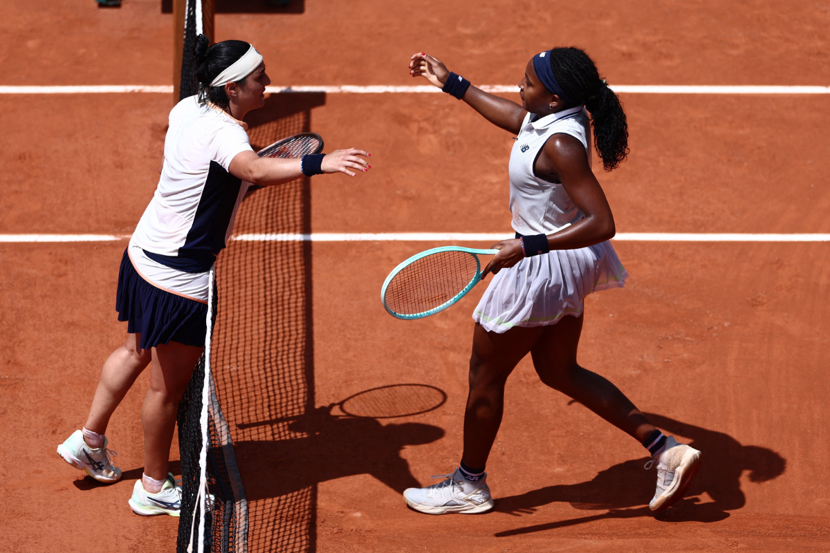 Coco Gauff hugs Tunisia's Ons Jabeur after winning her quarter-final match