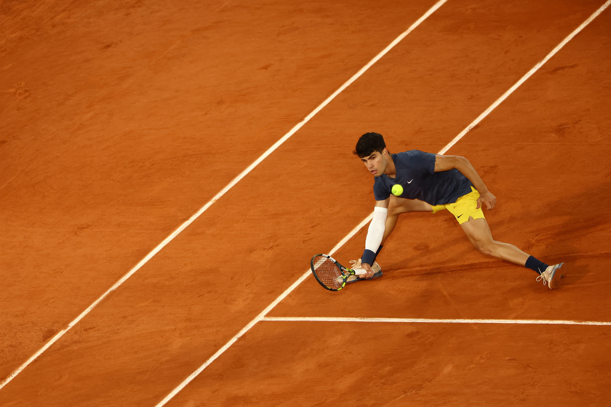 Spain's Carlos Alcaraz in action during his quarter final match against Greece's Stefanos Tsitsipas