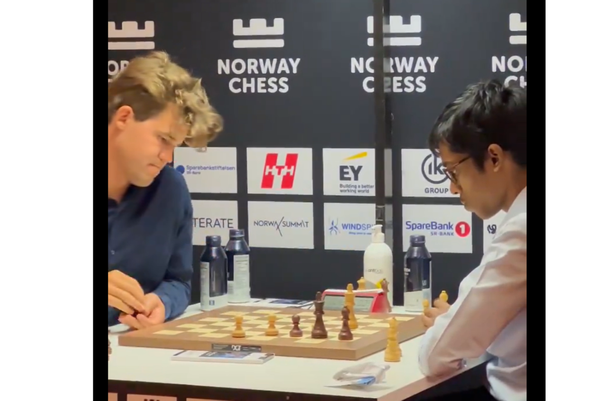 Magnus Carlsen and R Praggnanandhaa in action during their match at the Norway Chess tournament in Stavanger, Norway, on Tuesday