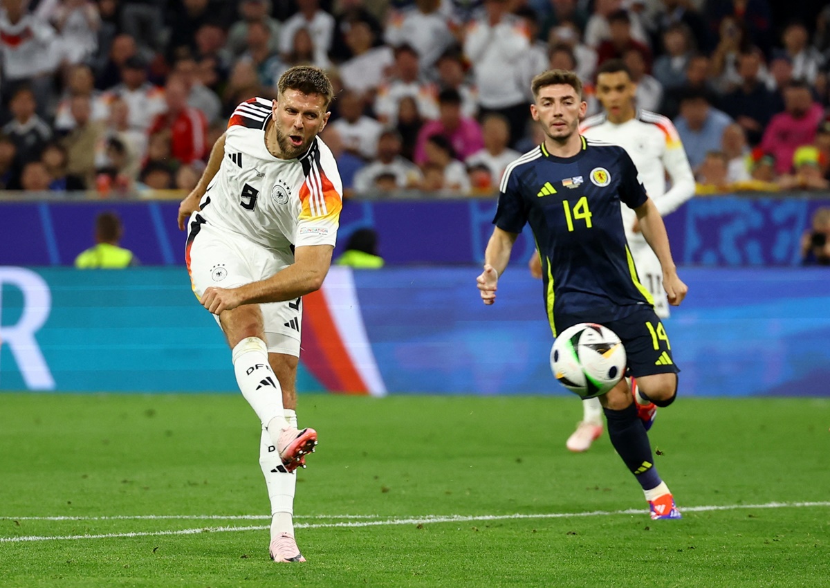 Niclas Fullkrug scores Germany's fourth goal.