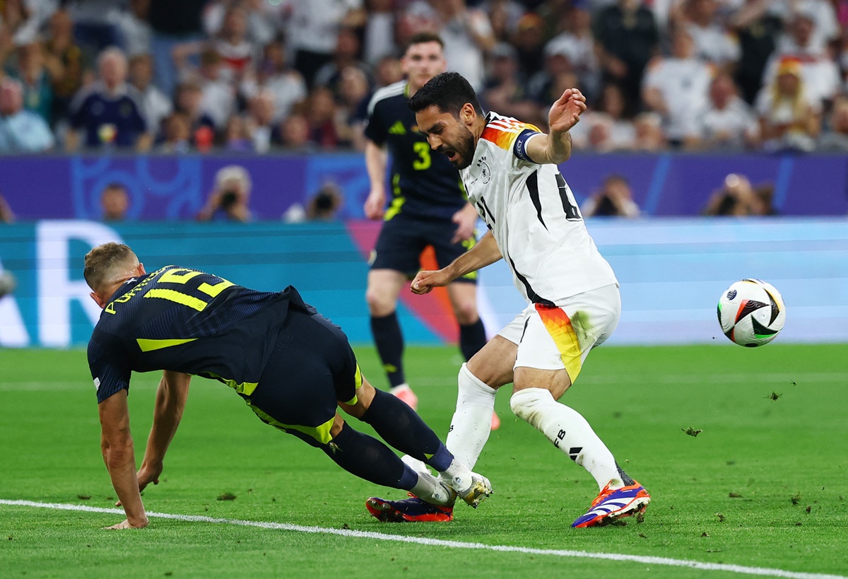 Scotland's Ryan Porteous fouls Germany's Ilkay Gundogan, resulting in a red card and penalty.