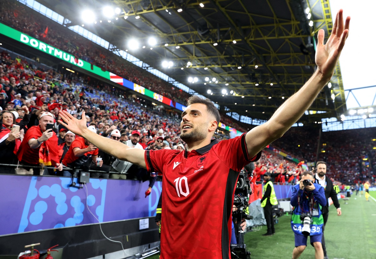 edim Bajrami celebrates giving Albania an early lead in the match.