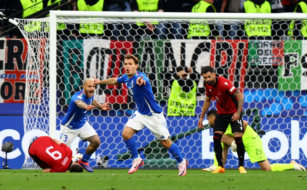 Italy's Nicolo Barella celebrates scoring Italy's second goal.