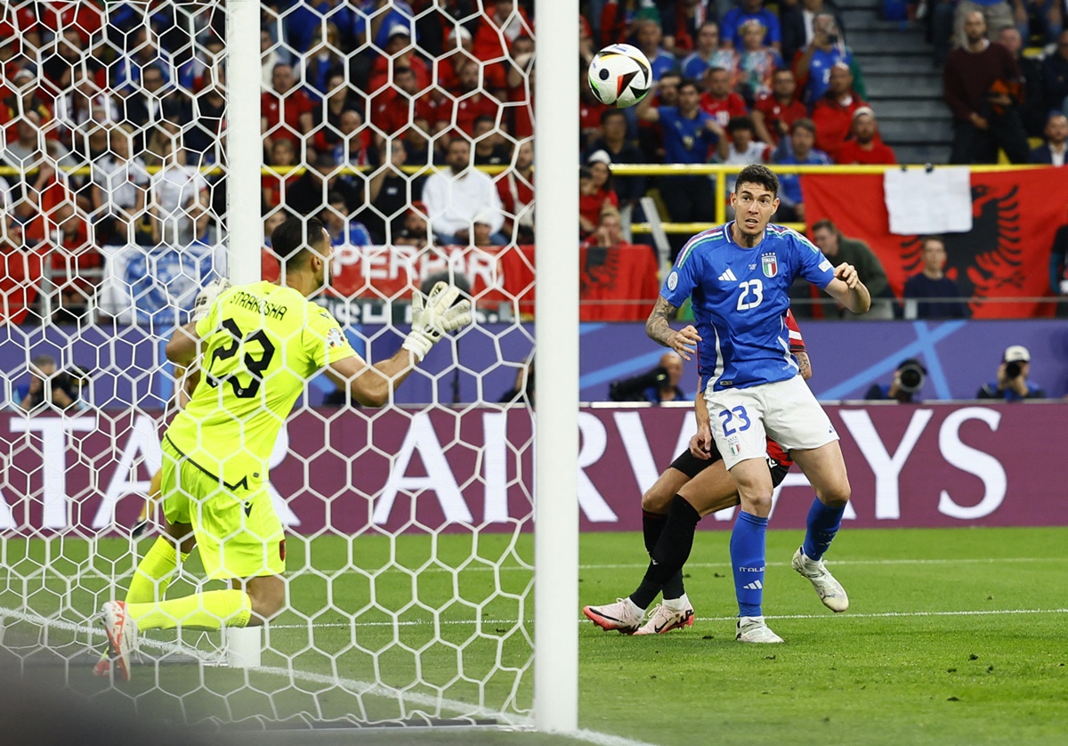 Alessandro Bastoni scores Italy's first goal past Albania's Thomas Strakosha during the Euro 2024 Group B match at Dortmund BVB Stadion, Dortmund, Germany, on Saturday.