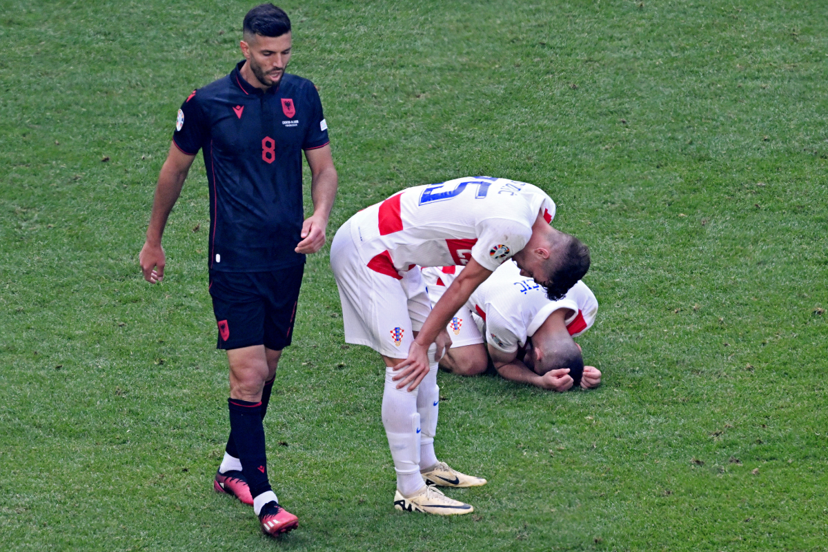 Albania's Klaus Gjasula and Croatia's Mario Pasalic react after the match against Albania on Wednesday 