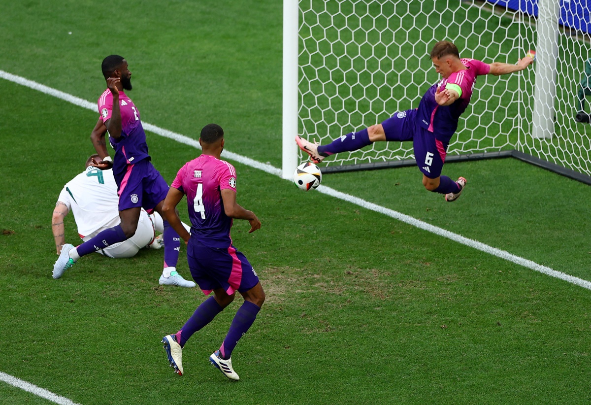  Germany defender Joshua Kimmich makes a goalline clearance.