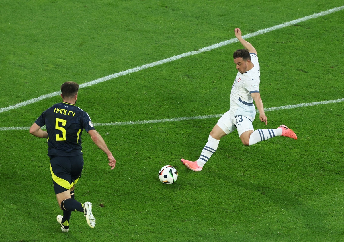 Xherdan Shaqiri gets into stride to send the ball curling into the Scotland net for Switzerland's equaliser in the Euro 2024 Group A match at Cologne stadium, in Cologne, Germany, on Thursday.