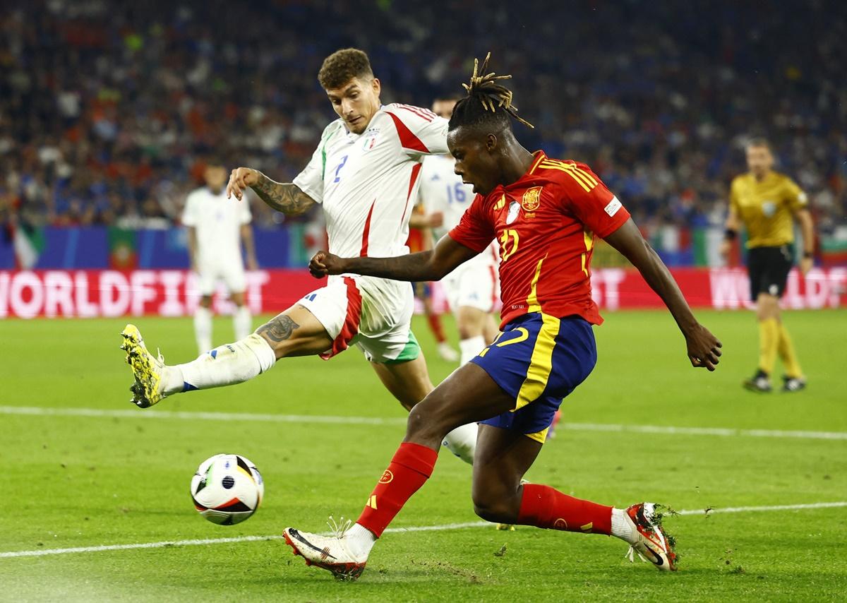 Nico Williams lays the cross which Italy defender Riccardo Calafiori deflects into his net for an own goal during the Euro 2024 Group B match at Arena AufSchalke, in Gelsenkirchen, Germany, on Thursday.