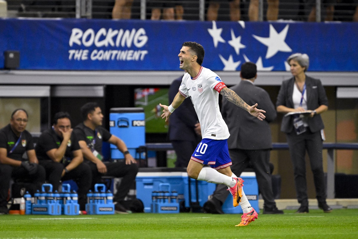 Christian Pulisic (No. 10) celebrates putting the United States ahead during the 2024 Copa America match against Bolivia at AT&T stadium, Texas, on Sunday.