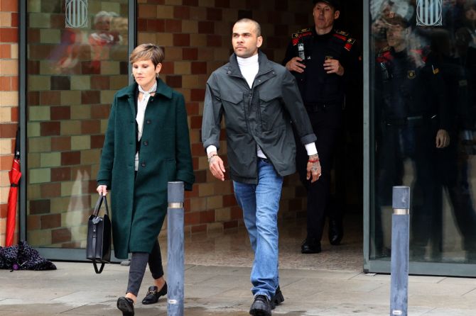Brazilian soccer player Dani Alves leaves the Brians 2 prison on bail along with his lawyer Ines Guardiola while he appeals his rape conviction, in Barcelona, Spain, on Mionday