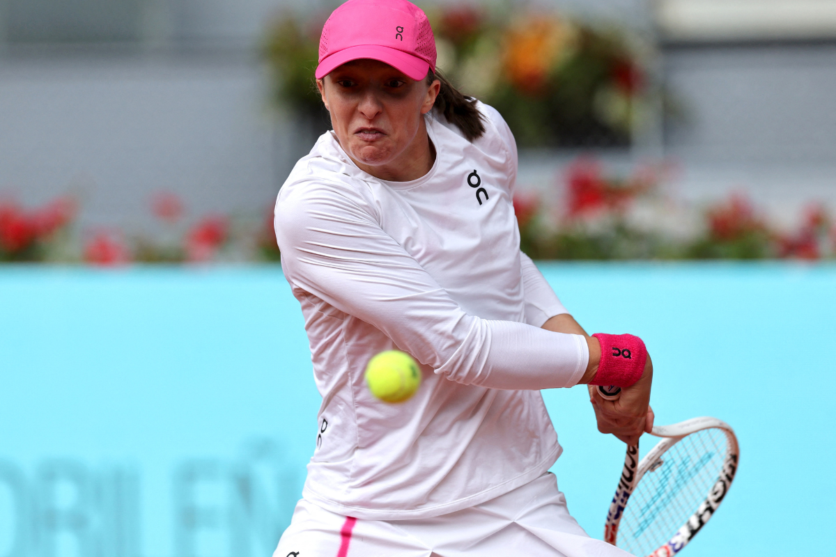 Poland's Iga Swiatek in action during her quarter final match against Brazil's Beatriz Haddad Maia 