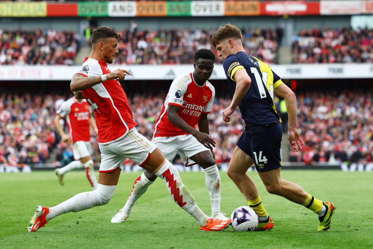 Arsenal's Ben White in action with AFC Bournemouth's Alex Scott