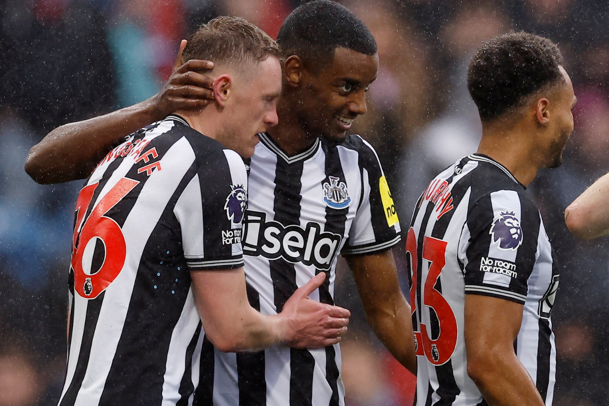 Newcastle United's Alexander Isak celebrates with Sean Longstaff after scoring their fourth goal against Burnley at Turf Moor, Burnley