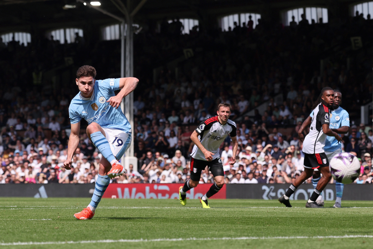 Manchester City's Julian Alvarez scores their fourth goal from the penalty spot