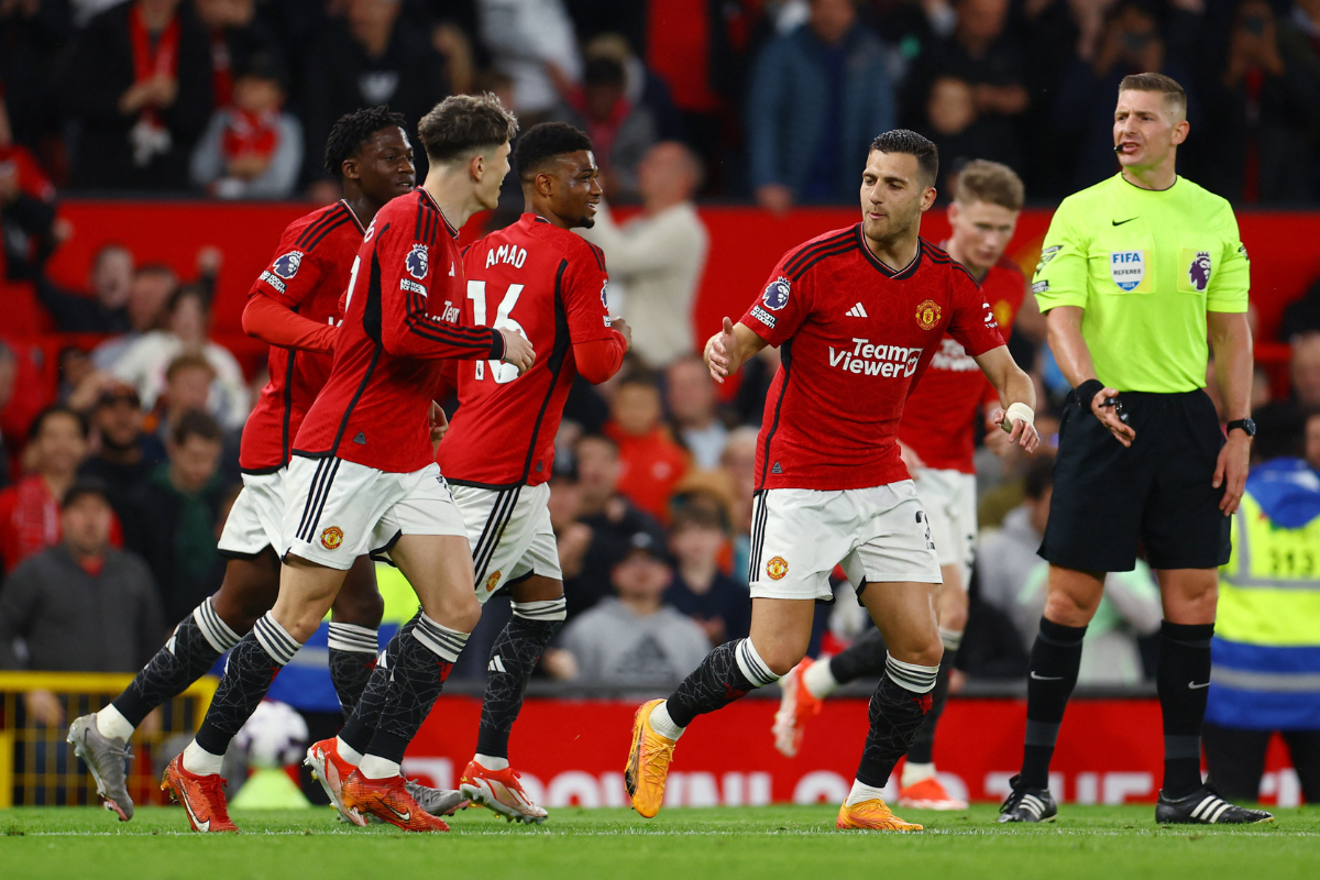 Manchester United's Amad Diallo celebrates scoring their second goal with teammates against Newcastle United at Old Trafford in Manchester, on Wednesday 