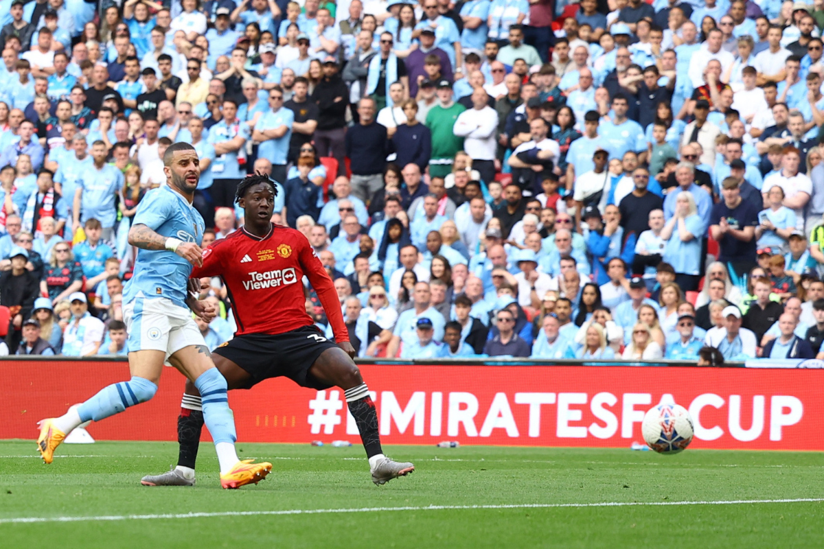 Manchester United's Kobbie Mainoo scores their second goal