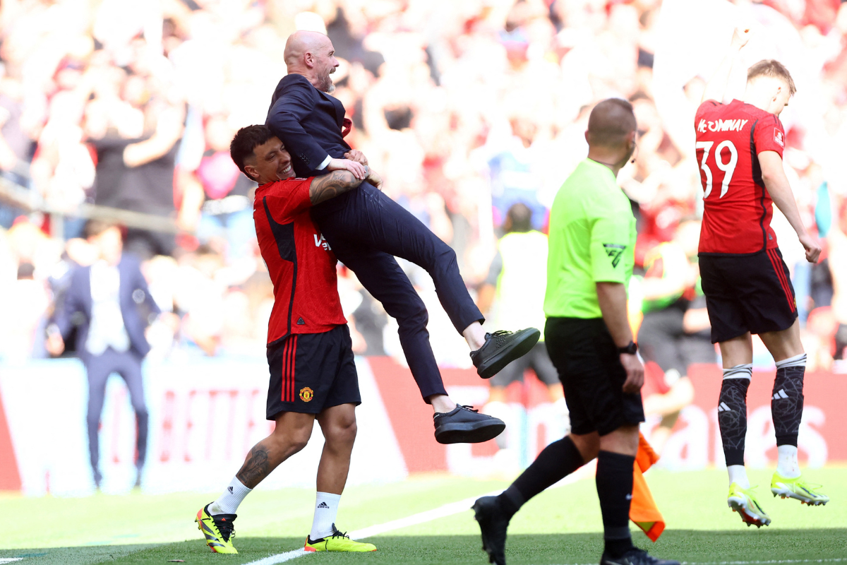 Manchester United's Lisandro Martinez and manager Erik ten Hag celebrate after winning the FA Cup 