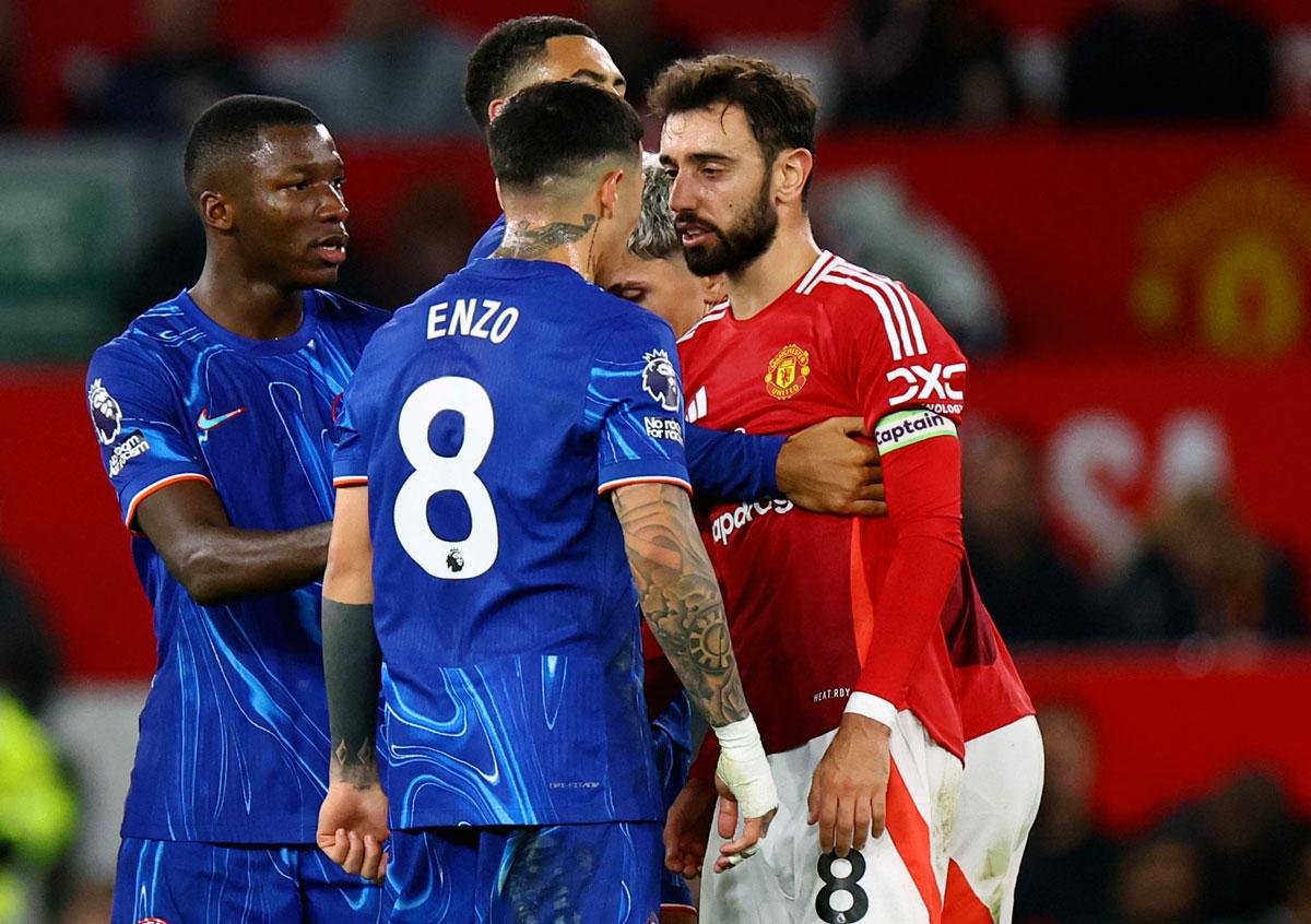 Enzo Fernandez clashes with Manchester United captain Bruno Fernandes