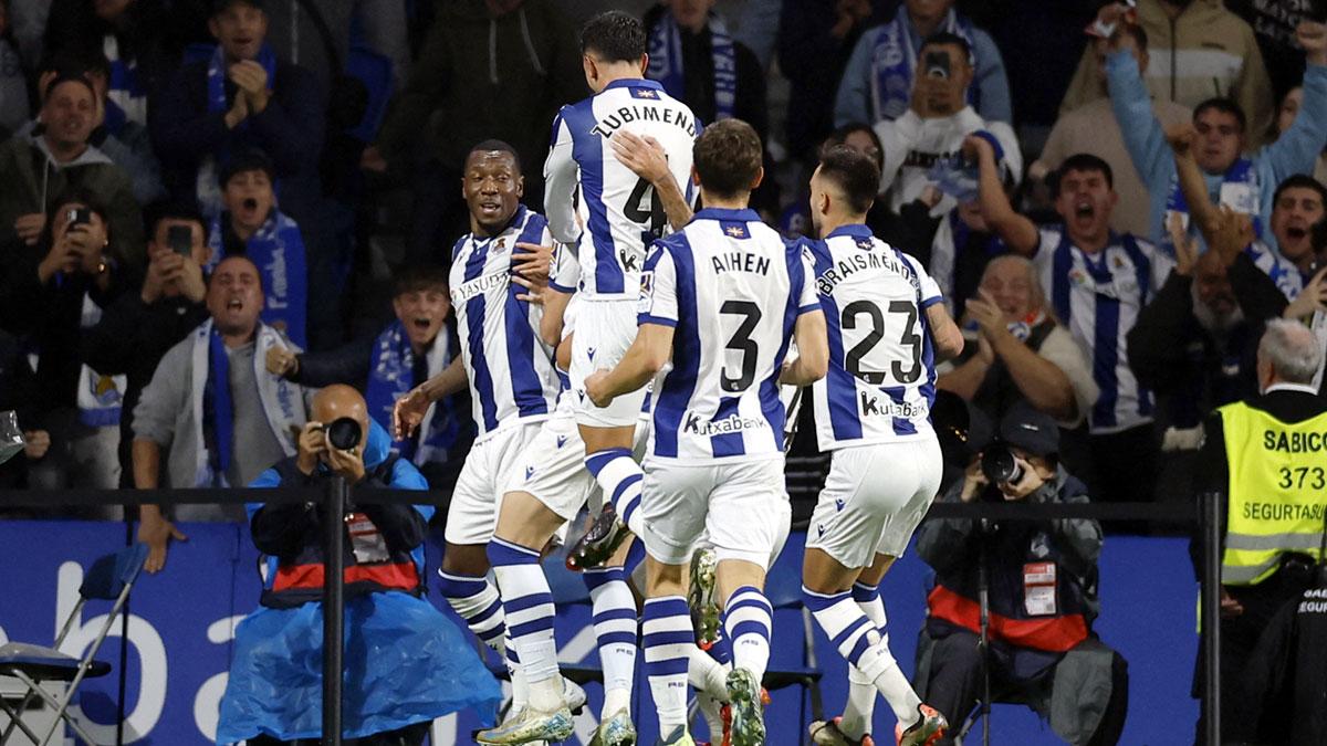 Real Sociedad's players celebrate after Sheraldo Becker scored the goal