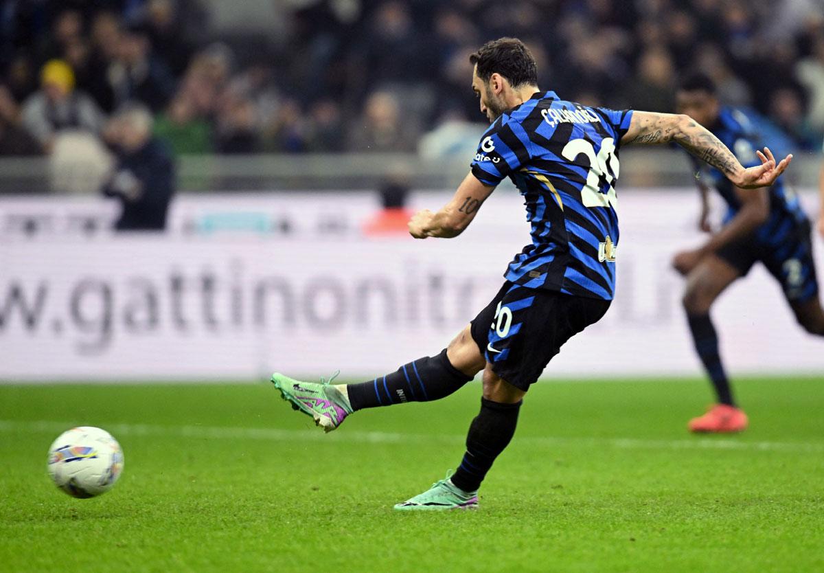 Inter Milan's Hakan Calhanoglu misses a penalty