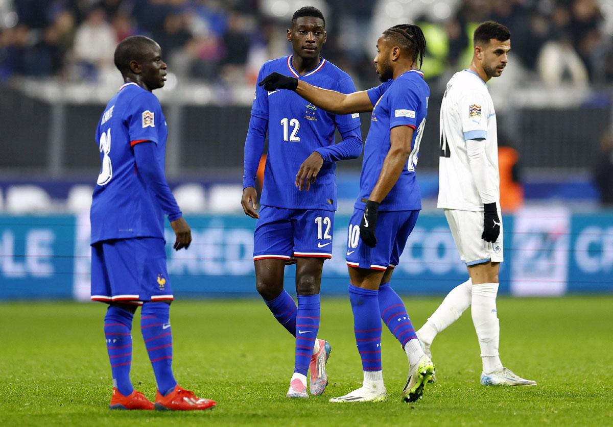 France's N'Golo Kante, Randal Kolo Muani and Christopher Nkunku during the match