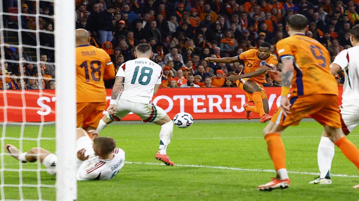 Denzel Dumfries scores the Netherlands' third goal against Hungary at the Johan Cruyff Arena, Amsterdam.