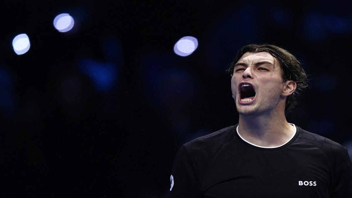 Taylor Fritz of the United States celebrates victory over Germany's Alexander Zverev in the semi-finals.