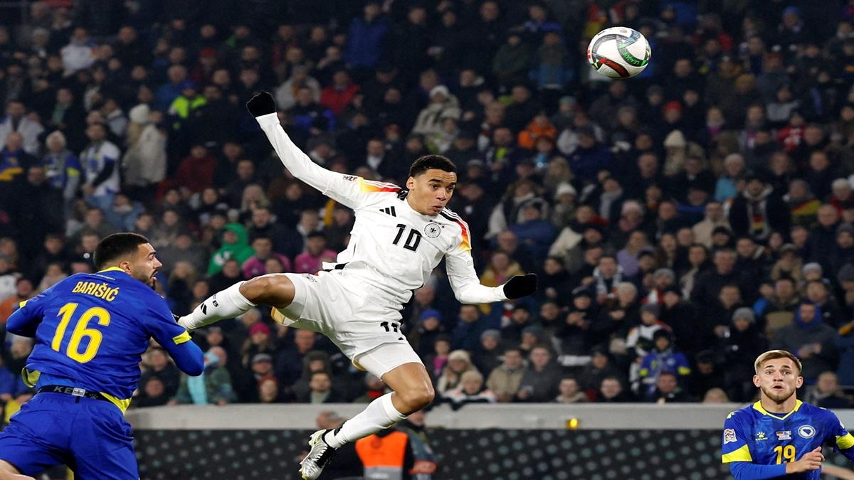 Jamal Musiala scores Germany's opening goal in the Nations League match against Bosnia and Herzegovina, at Europa Park Stadion, Freiburg, Germany, on Saturday.