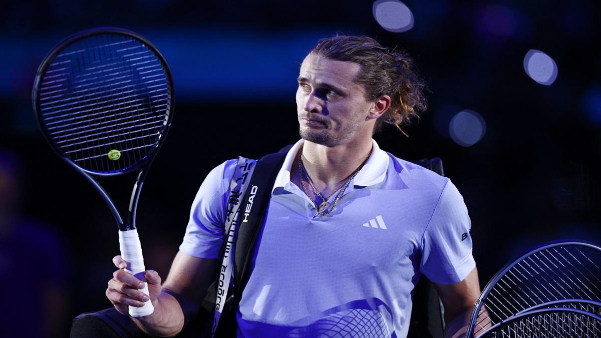 Alexander Zverev leaves the court after losing to Taylor Fritz.