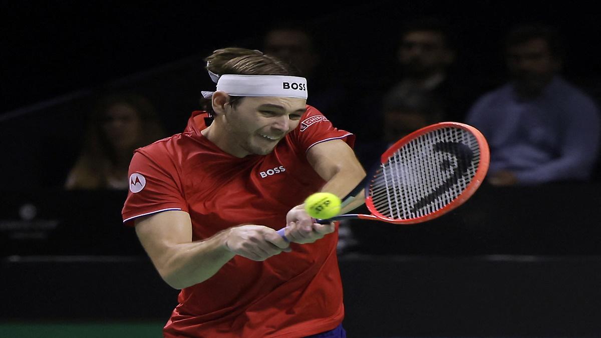 The United States' Taylor Fritz in action during his singles match against Australia's Alex de Minaur.