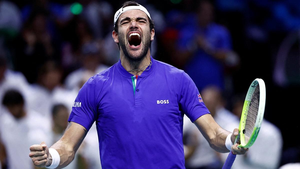 Matteo Berrettini celebrates after winning his singles match against Thanasi Kokkinakis.