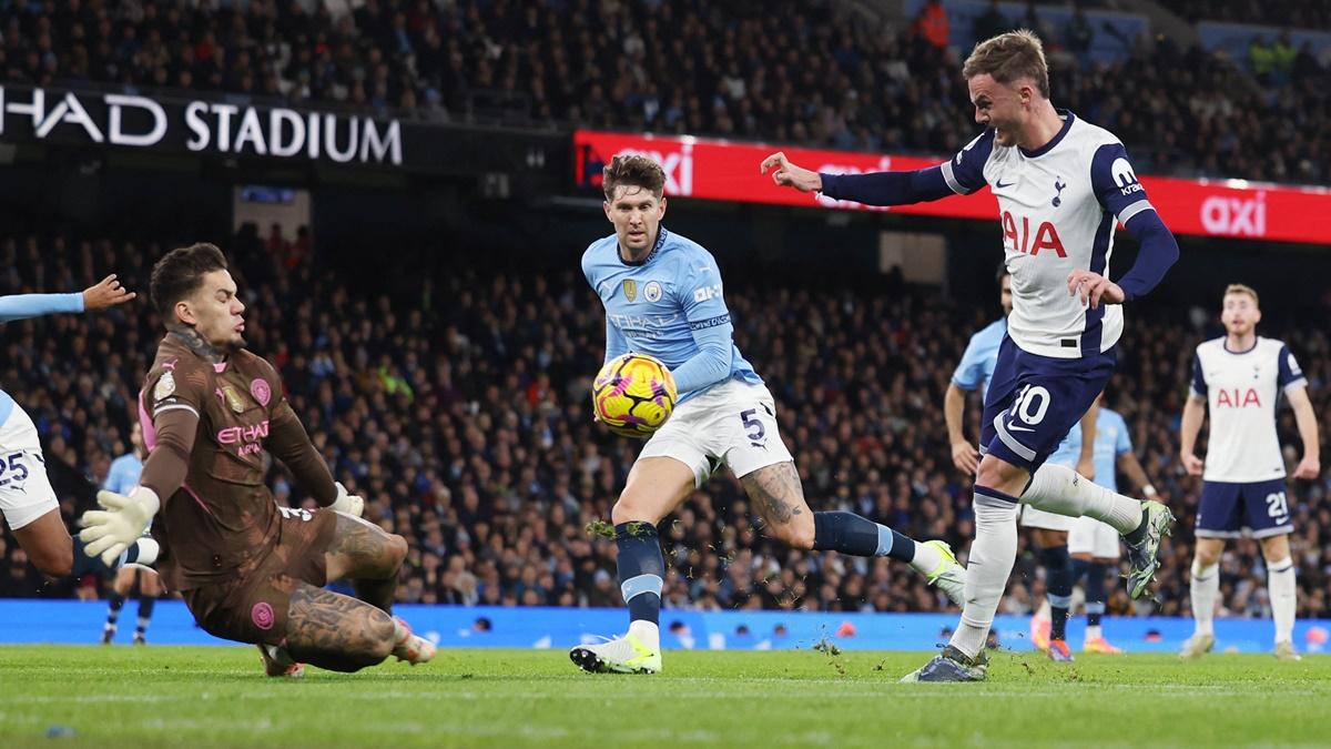 James Maddison scores Tottenham Hotspur's second goal past goalkeeper Ederson.