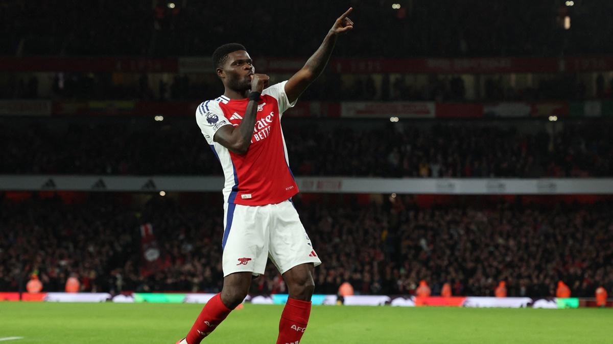 Thomas Partey celebrates scoring Arsenal's second goal.