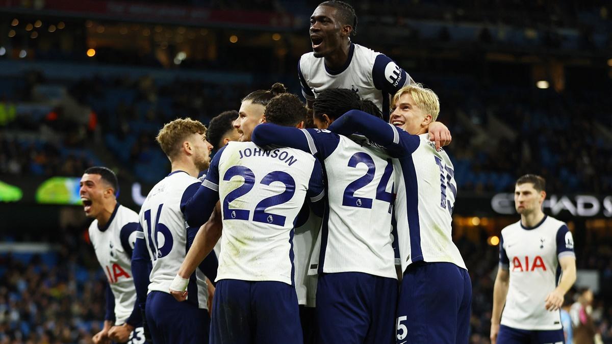 Brennan Johnson celebrates with teammates after scoring Tottenham Hotspur's fourth goal in the Premier League match against Manchester City at Etihad Stadium, Manchester, on Saturday.