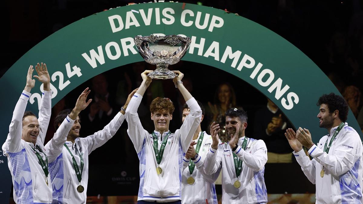 Italy's players celebrate with the Davis Cup after victory over the Netherlands in the final at Palacio de Deportes Jose Maria Martin Carpena Arena, Malaga, Spain, on Sunday.