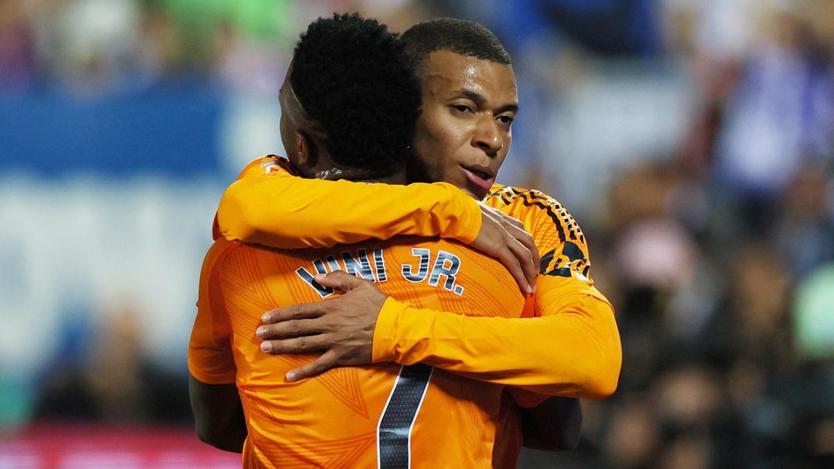 Kylian Mbappe celebrates with Vinicius Junior after scoring Real Madrid's opening goal in the LaLiga match against Leganes at Estadio Municipal de Butarque, Leganes, Spain, on Sunday.