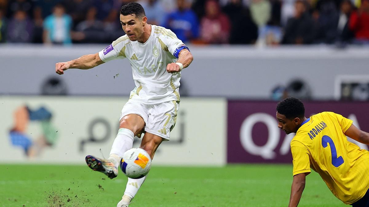 Cristiano Ronaldo scores Al Nassr's third goal during the Asian Champions League Group B match against Al Gharafa at Al Bayt Stadium, Al Khor, Qatar, on Monday.