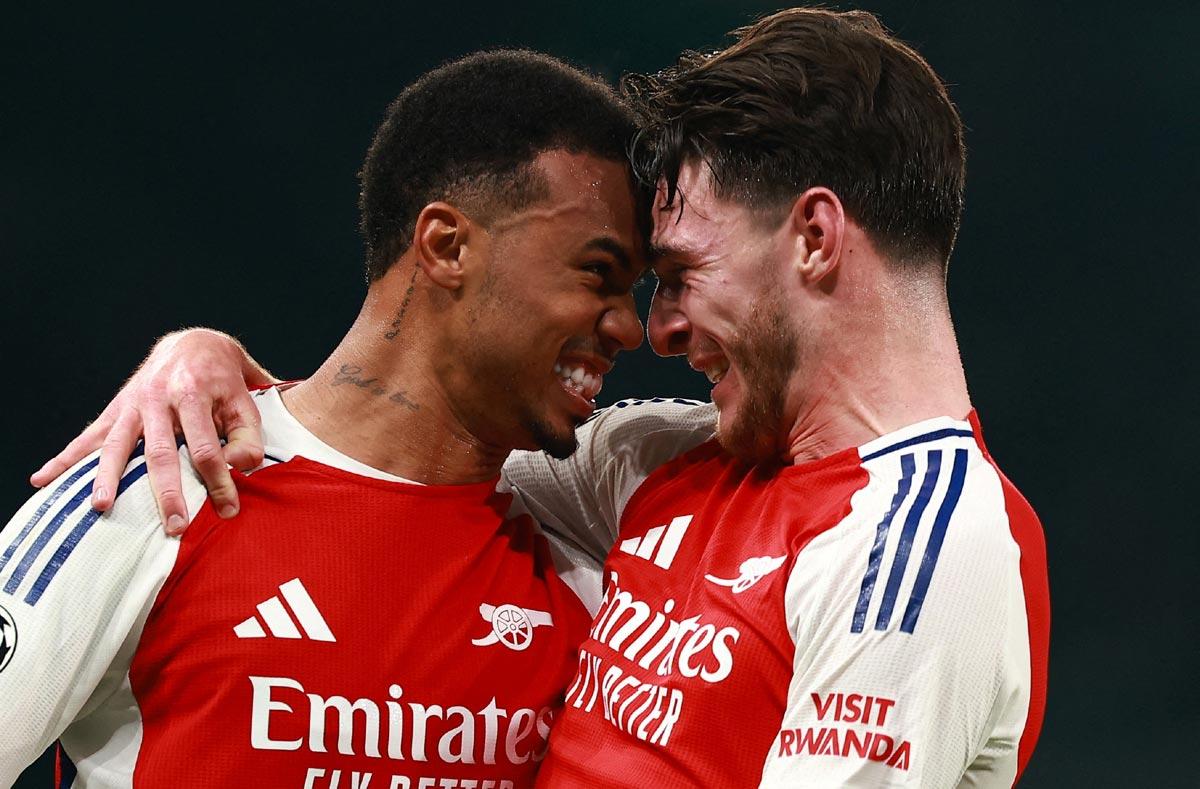 Arsenal's Gabriel Magalhaes celebrates with Declan Rice