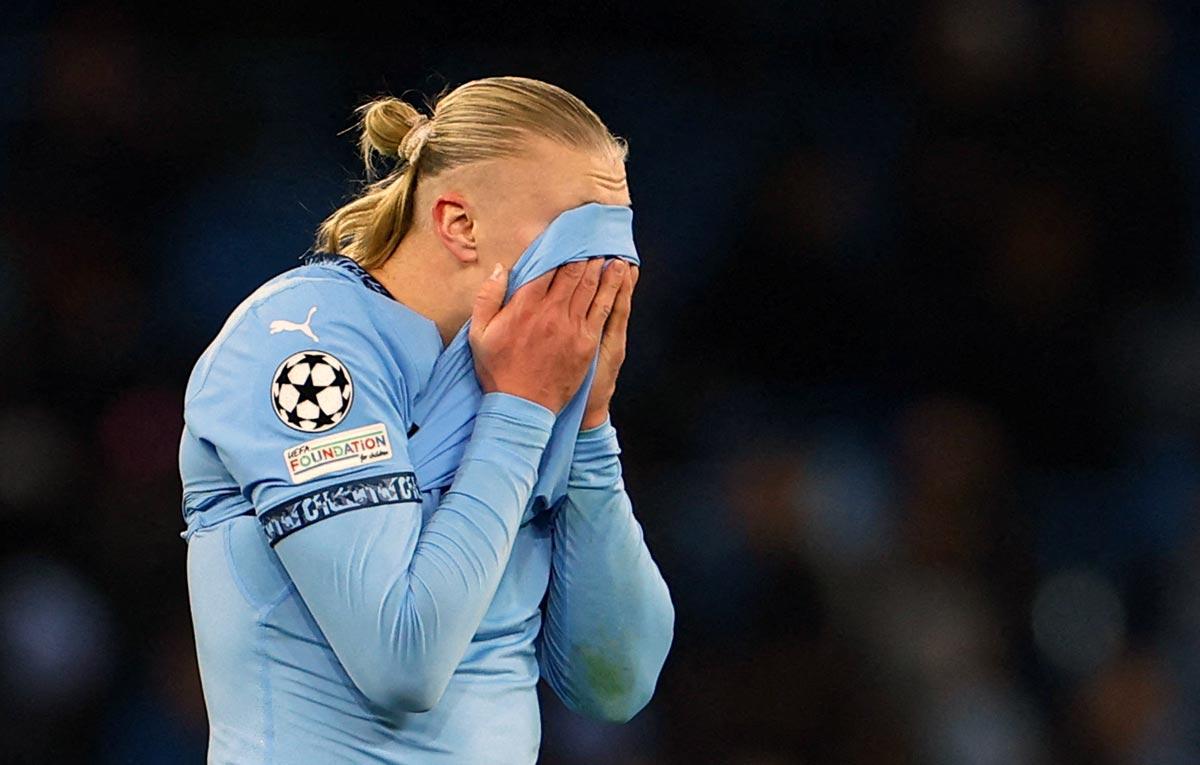 Manchester City's Erling Haaland shows his dejection