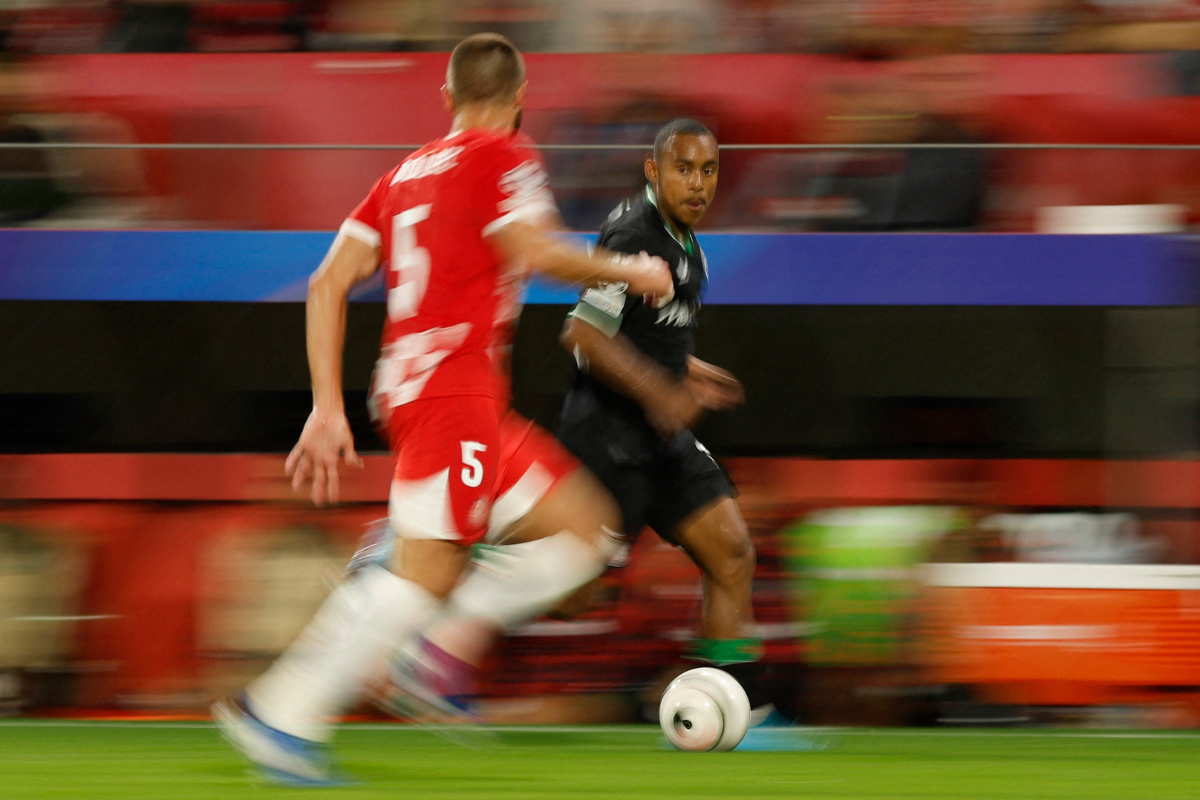 Feyenoord's Igor Paixao in action with Girona's David Lopez during their match at Estadi Montilivi, Girona, Spain