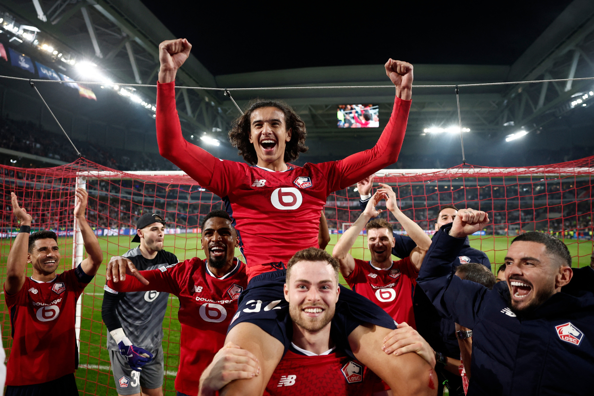 Lille's Ayyoub Bouaddi celebrates with teammates after their win over Real Madrid in their Champions League match Decathlon Arena Stade Pierre-Mauroy, Lille, France