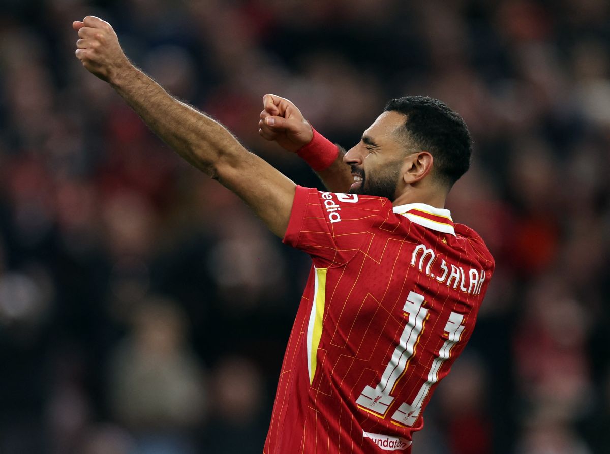 Mohamed Salah celebrates scoring Liverpool's second goal against Bologna