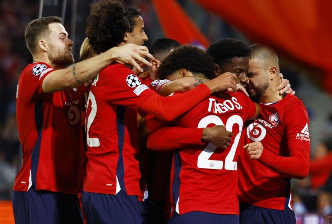 Lille's players celebrate after Jonathan David scored the goal three minutes into first-half stoppage time 