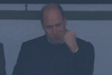 Prince William pumps his fists in joy after Aston Villa's late win over Bayern Munich in the Champions League on Wednesday